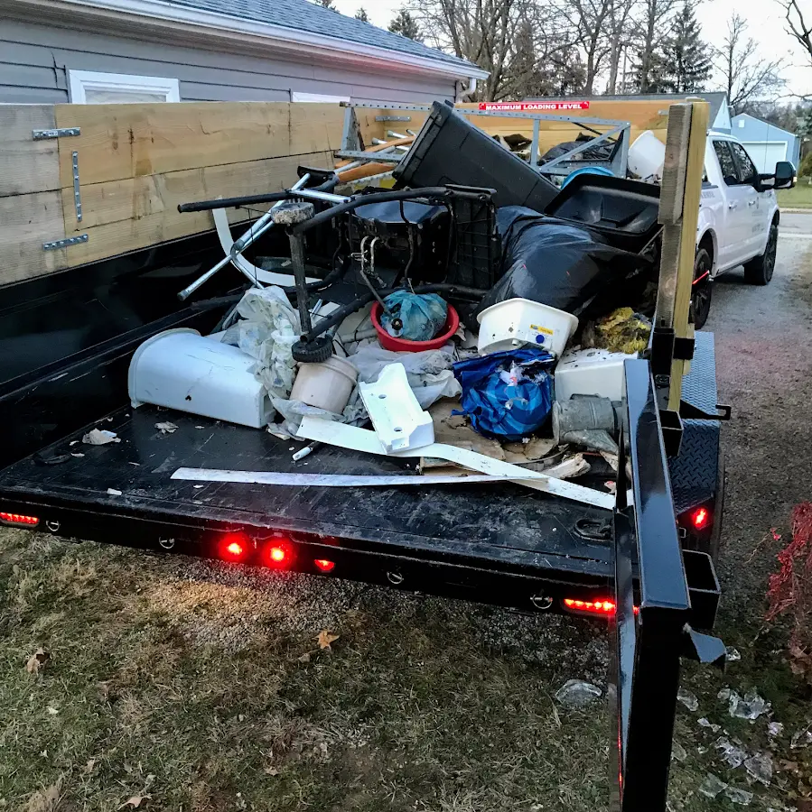 Roll-off dumpster delivered to a residential driveway in PiÃÂ±on Hills